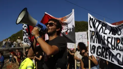France-Wide Strikes Erupt Against Fiscal Reductions
