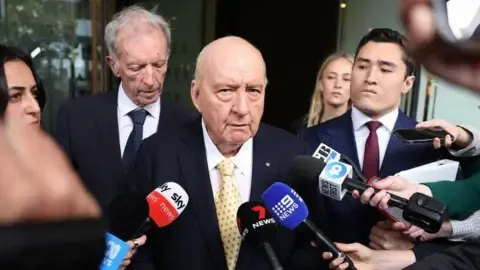 Sex Abuse Charges Against Top Australian Radio Host Reduced
